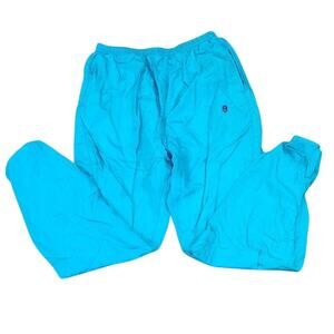 Lady Antigua windbreaker pants zip ankle with elastic versatility and function